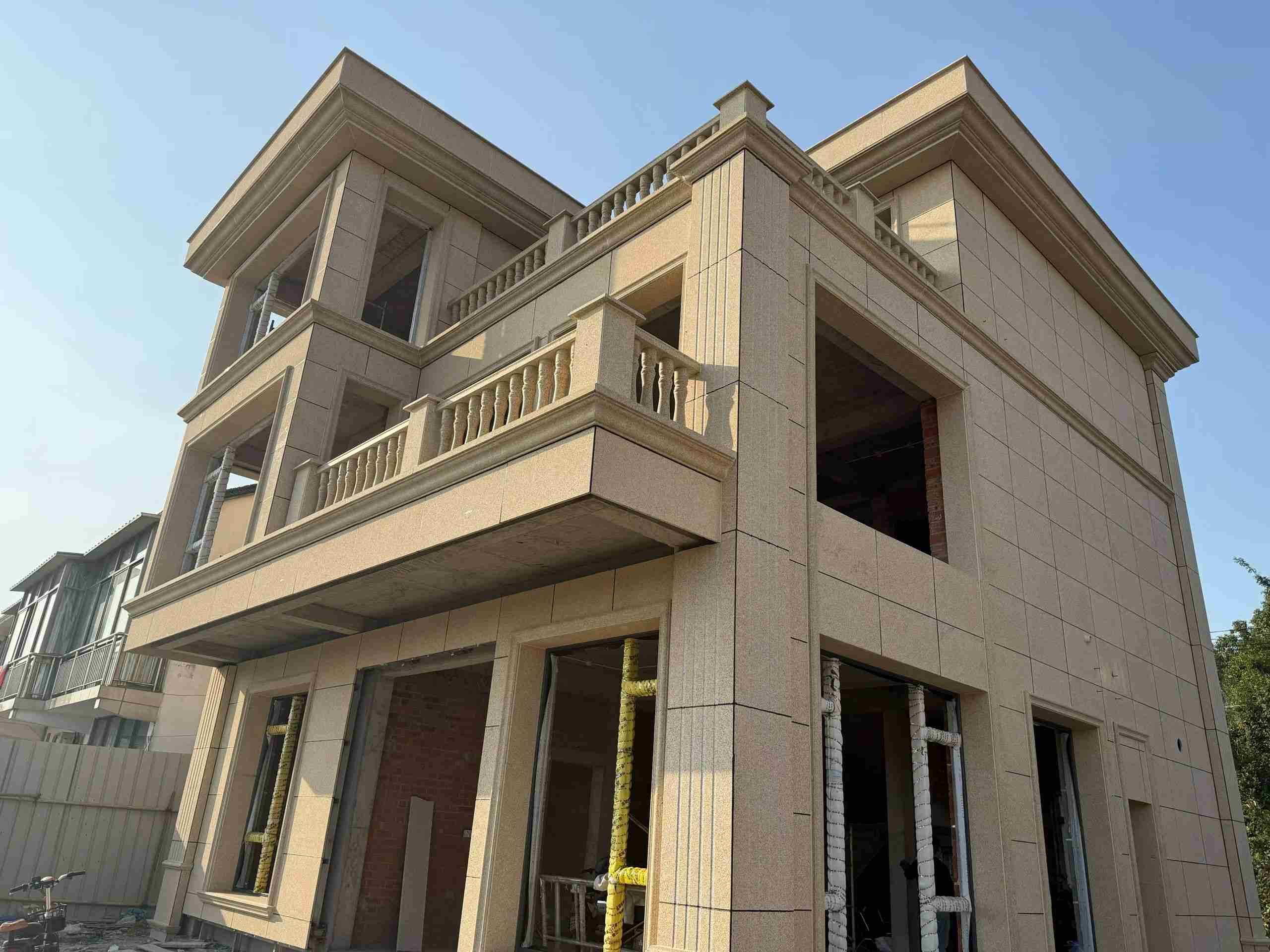 淮北 黄金麻花岗岩石材荔枝面外墙干挂效果展示